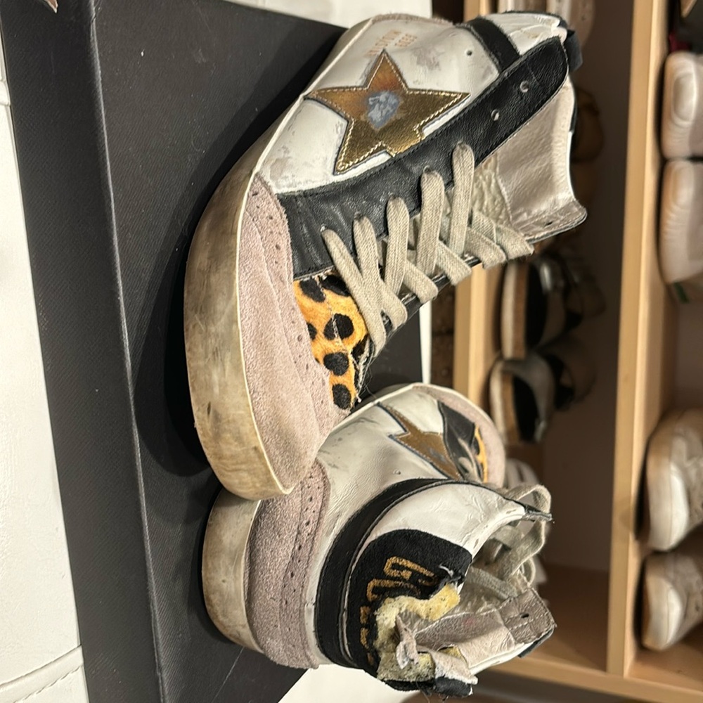 Golden goose size 38 - weathered condition back of one of the shoes torn
